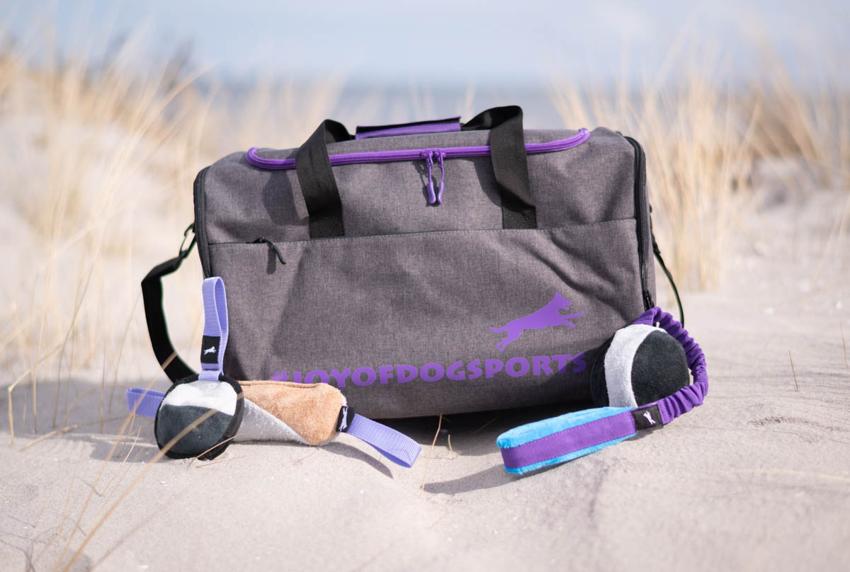 ReissuPakki harmaa-lila lelujen kanssa