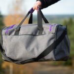 ReissuPakki lila ja toinen sivutasku